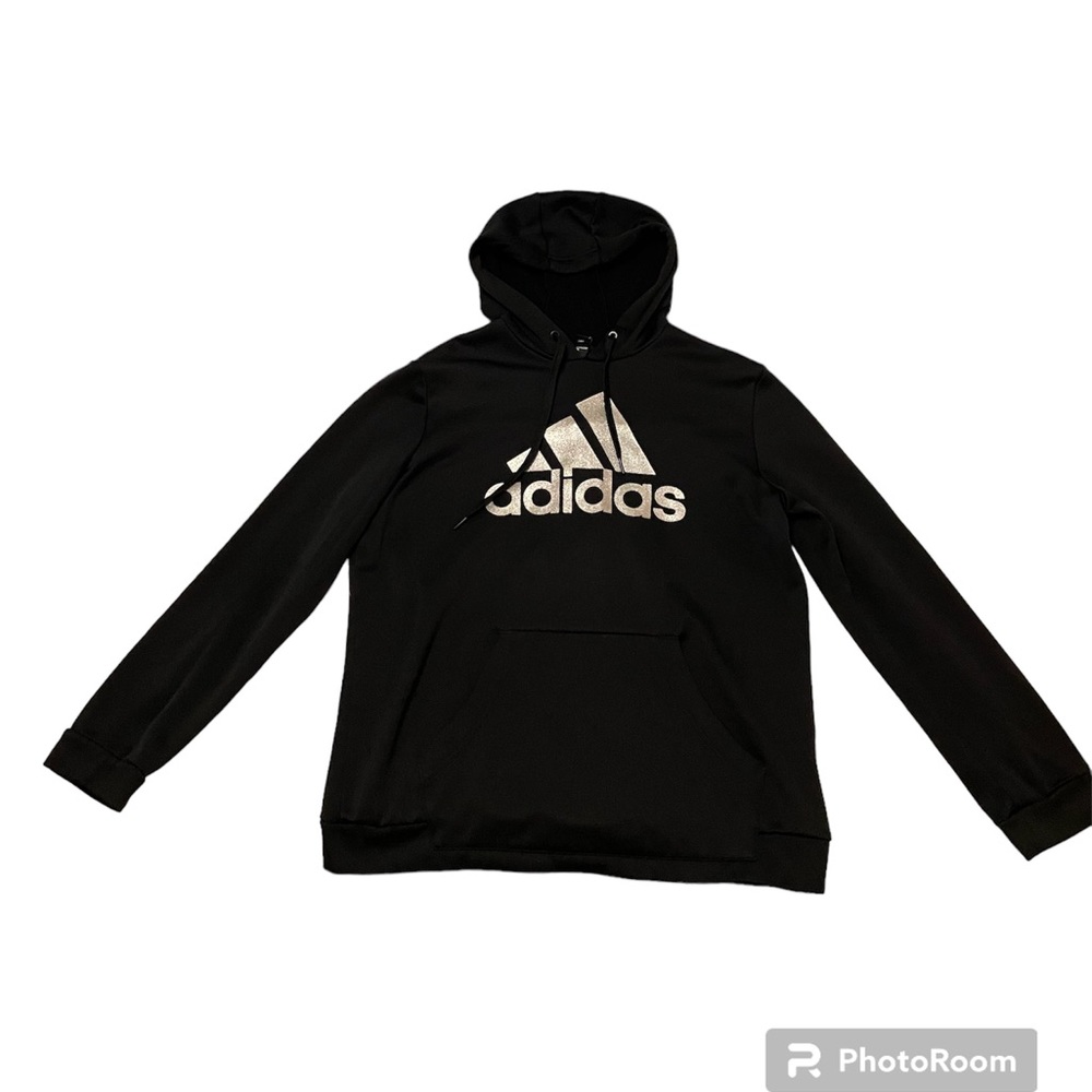 Woman’s black Adidas jacket